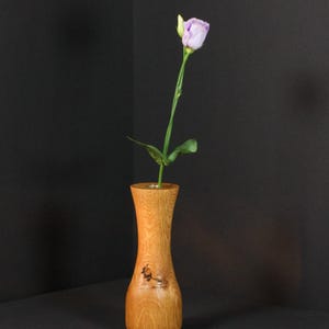 beautiful stalk vase made of oak