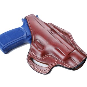 thumbnail interactive-video image 1 of Pro Heavy Duty Competition Holster For Bersa TPR9 XT 1 of 10