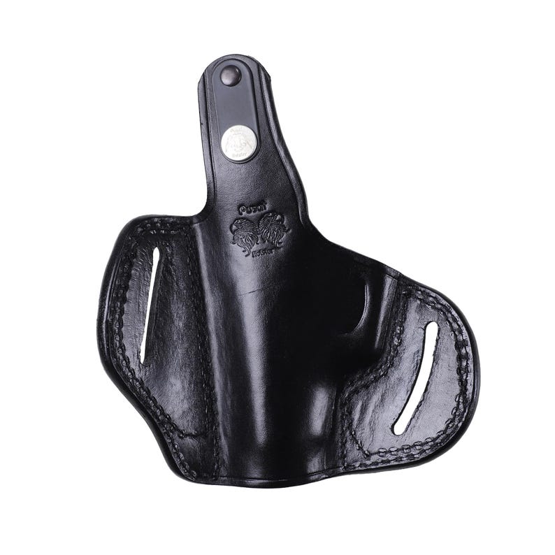 Handmade Black Right Hand leather OWB pancake holster by Pusat Holster, precision-molded for Beretta 84, 84BB, 84F, and 84FS Cheetah .380 ACP models. The image highlights the 100% premium genuine leather texture, hand-polished edges, and heavy-duty stitching on a white background. Features a secure thumb break with durable brass snaps and 304 stainless steel hardware. Designed for a perfect, rattle-free fit, offering a blend of classic style and tactical durability for daily carry.