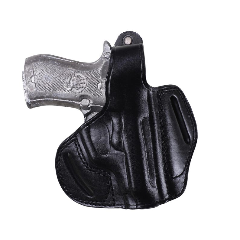 Handmade Black Right Hand leather OWB pancake holster by Pusat Holster, precision-molded for Beretta 84, 84BB, 84F, and 84FS Cheetah .380 ACP models. The image highlights the 100% premium genuine leather texture, hand-polished edges, and heavy-duty stitching on a white background. Features a secure thumb break with durable brass snaps and 304 stainless steel hardware. Designed for a perfect, rattle-free fit, offering a blend of classic style and tactical durability for daily carry.
