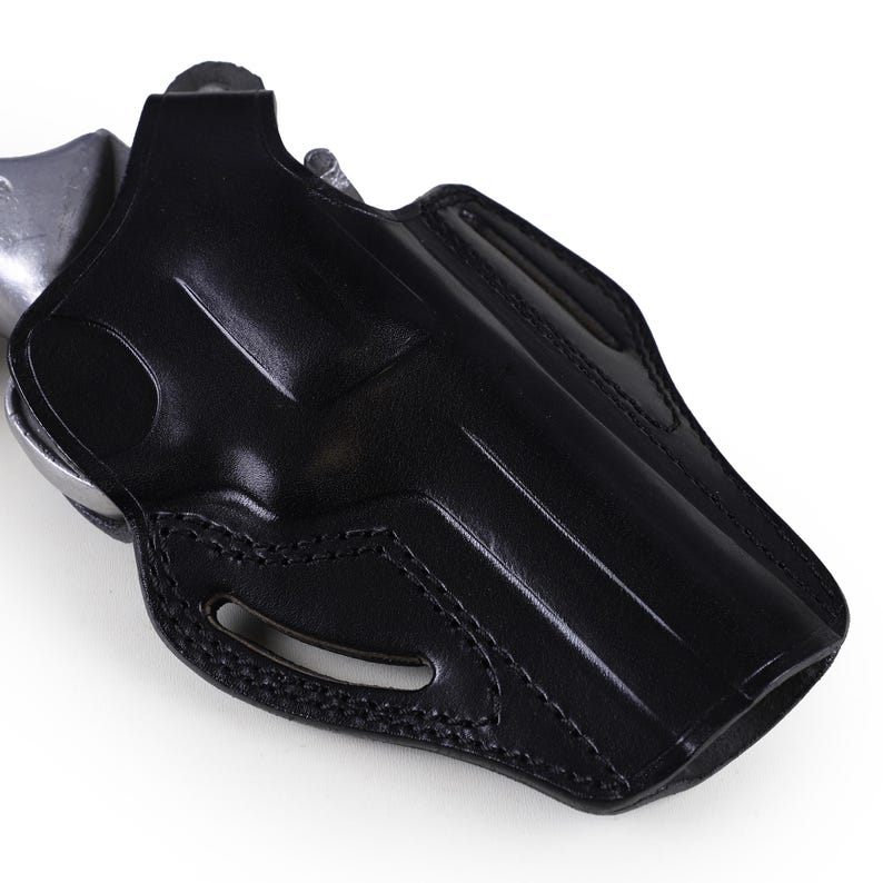 Premium brown leather OWB holster with thumb break for Colt Python 4.25 inch, 2-slot belt carry design, hand-molded revolver case