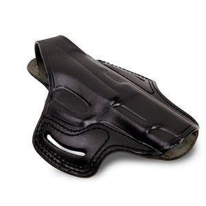 May include: A black leather holster for a handgun. The holster has a belt loop and a snap closure.