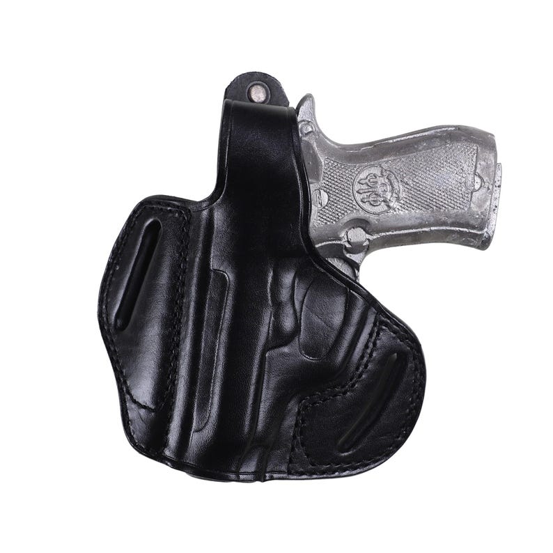 Handmade Black Left Hand leather OWB pancake holster by Pusat Holster, precision-molded for Beretta 84, 84BB, 84F, and 84FS Cheetah .380 ACP models. The image highlights the 100% premium genuine leather texture, hand-polished edges, and heavy-duty stitching on a white background. Features a secure thumb break with durable brass snaps and 304 stainless steel hardware. Designed for a perfect, rattle-free fit, offering a blend of classic style and tactical durability for daily carry.