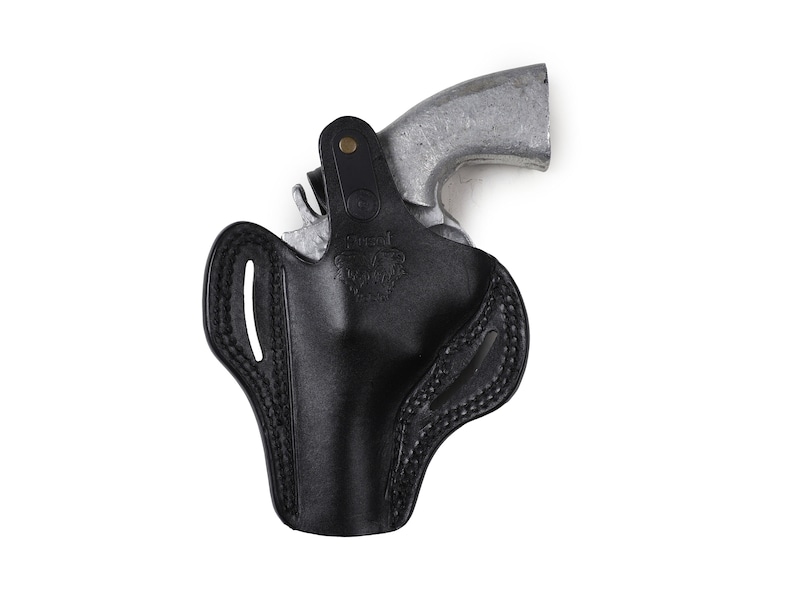 May include: A black leather holster with a stitched design. The holster is designed to hold a small silver revolver.