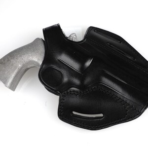 Colt Python 4.25 inch leather holster with 3-slot belt loop for vertical or angled carry, thumb break security, premium brown cowhide.