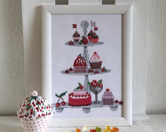 Picture, cake stand with muffins, cross-stitched in white wooden frame