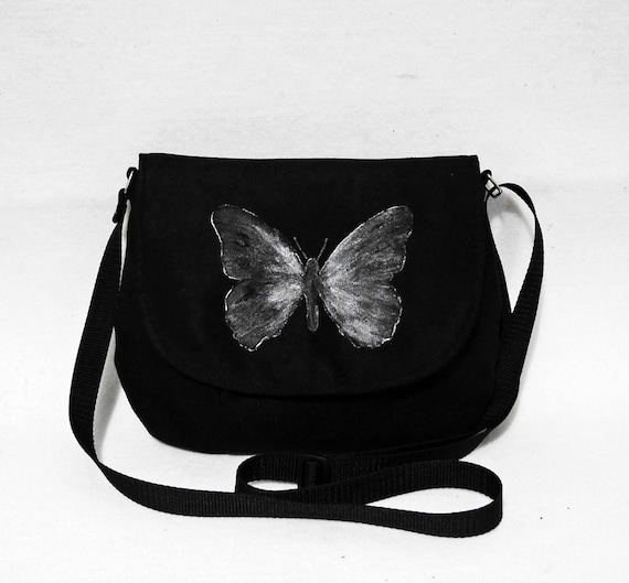Messenger bag painted with a butterfly