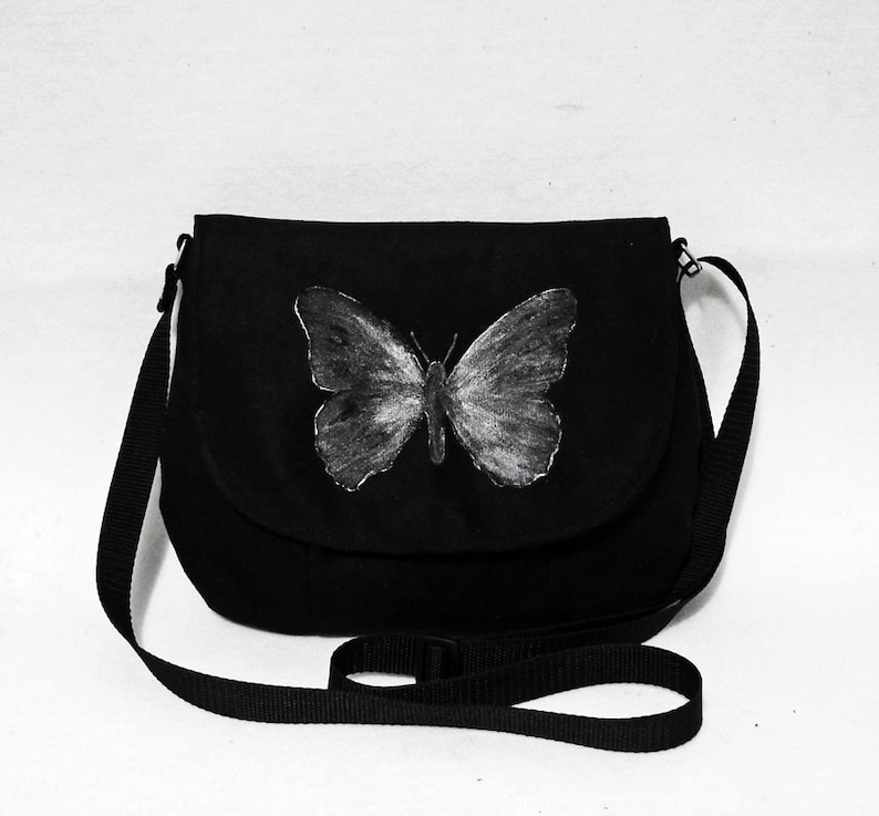 Messenger bag painted with a butterfly image 1