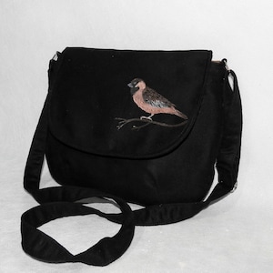 Bolso bandolera de ante pintado con un pájaro