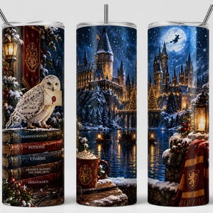 May include: A cylindrical tumbler with a metal straw featuring a snowy winter scene of a castle, a white owl holding an envelope, a stack of books labelled Transfiguration, Potions, Charms, Defence Against the Dark Arts, and Heratology, and a scarf.