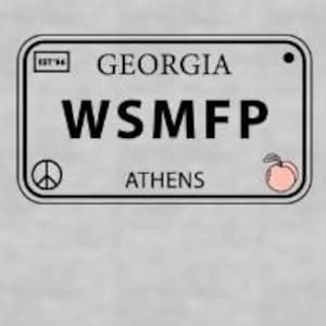 May include: A gray t-shirt with a black and white graphic of a Georgia license plate that says "WSMFP" and "ATHENS". The license plate has a peach graphic in the corner.