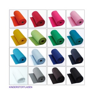 Könnte beinhalten: Eine Sammlung von 12 Filzrollen in verschiedenen Farben, darunter Rot, Orange, Gelb, Grün, Blau, Lila, Rosa, Weiß, Grau und Schwarz. Die Rollen sind in einem Rastermuster auf weißem Hintergrund angeordnet.