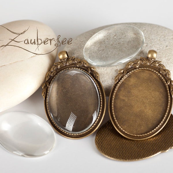 3 oval vintage settings and 30 x 40 glass cabochon