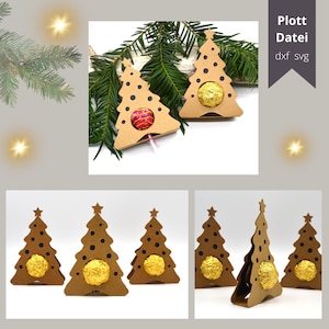 Puede incluir: Cinco cajas de cartón marrón en forma de árbol de Navidad con lunares negros y una estrella en la parte superior. Cada caja tiene un círculo recortado en el centro para contener un chocolate u otro dulce. El texto "Plott Datei dxf svg" está en la esquina superior derecha de la imagen.