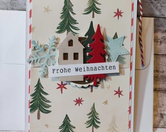 Christmas card: house and Christmas trees