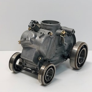 Artistic Car Sculpture: Crafted from Carburetor