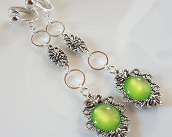 Ear clips with green glass cabochons