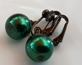 Bronze ear clips with 12 mm green beads