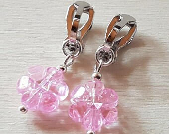 Children's ear clips with pink glitter flowers