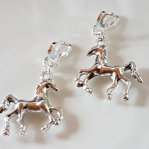 Children's ear clips with horse pony