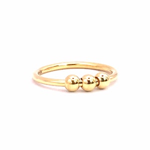 Fidget ring in 18kt yellow gold