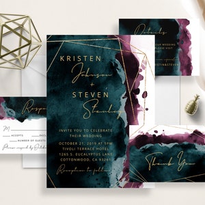May include: Wedding invitation suite with teal and burgundy watercolor backgrounds. The invitation features gold geometric accents and the text "Kristen Johnson + Steven Stanley". The RSVP card has the text "RSVP" and the details card has the text "Details".