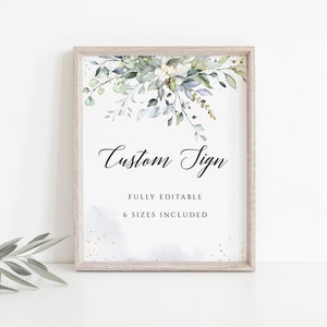 May include: A printable sign with a watercolor floral design in shades of green and blue. The sign says "Custom Sign" and "Fully Editable, 6 Sizes Included".
