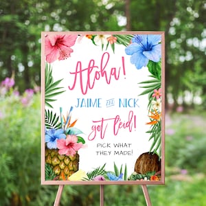 May include: Aloha! Jaime and Nick got leid! Pick what they made! A tropical wedding sign with a pineapple, coconut, and hibiscus flowers.