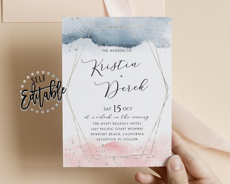 May include: A wedding invitation with a watercolor background in shades of blue and pink with gold glitter accents. The invitation features a geometric frame with the names Kristin and Derek and the wedding date, Saturday, October 15th.