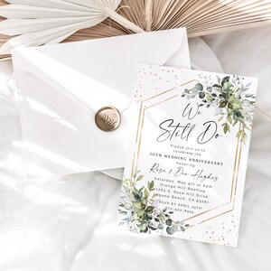 May include: A gold and white wedding anniversary invitation with green foliage and gold glitter. The invitation reads "We Still Do" and includes the couple's names, date, time, and location. RSVP by April 25th.