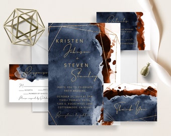 May include: Wedding invitation suite with a blue and brown watercolor background and gold geometric accents. The invitation features the names "Kristen Johnson" and "Steven Stanley" and the date "October 21, 2019".