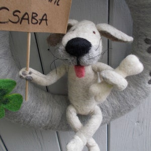 Door wreath with dog, shamrocks and paw prints made of felt Beige