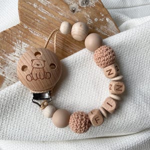 Cadena para chupete personalizada para niñas y niños en muchos colores, ideal como regalo para un recién nacido.
