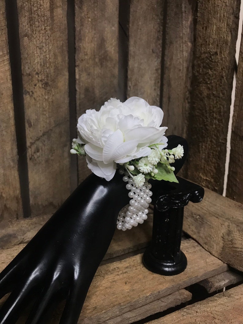 Artificial white wrist corsage