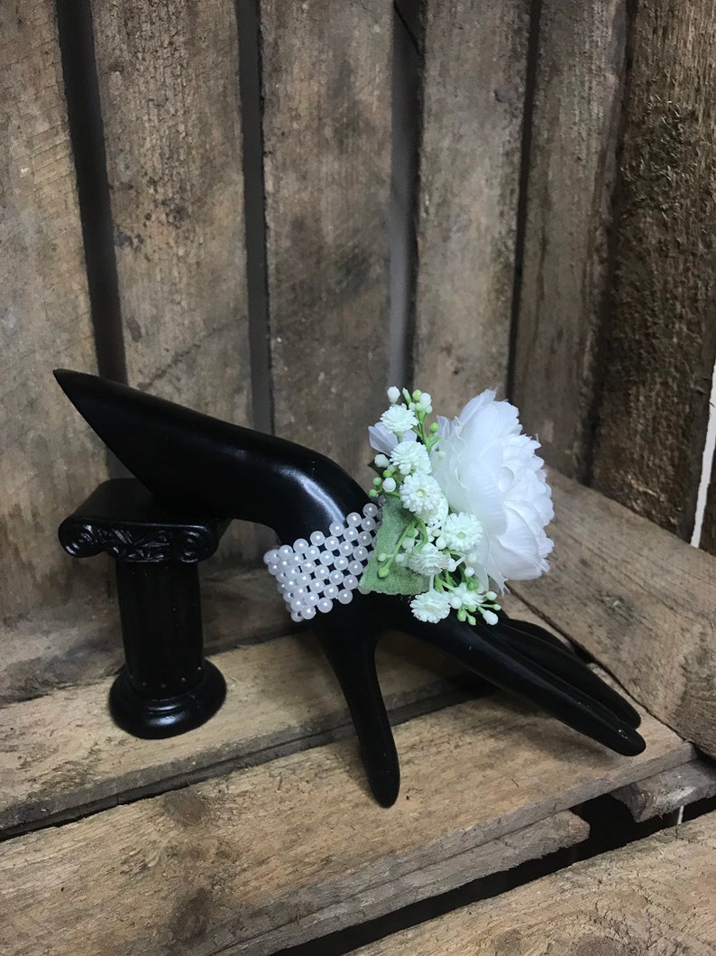 Artificial white wrist corsage