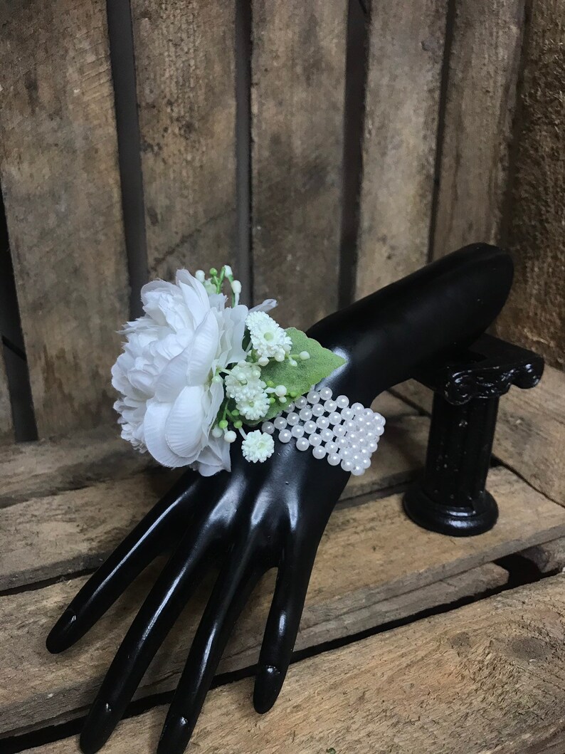 Artificial white wrist corsage