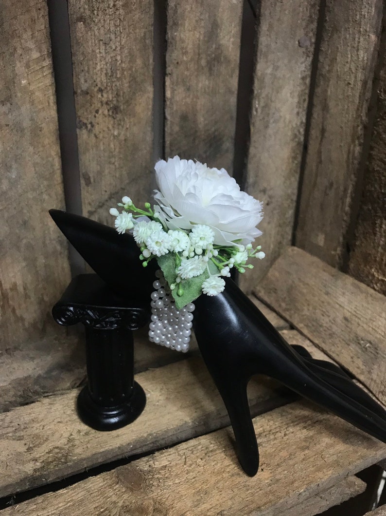 Artificial white wrist corsage