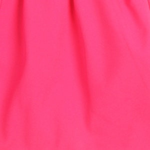 May include: A bright pink fabric with a smooth texture.