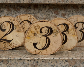 Table numbers Wedding made of wooden discs freestanding for the wedding celebration or other occasions