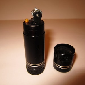 robust petrol lighter 1950s, very high-quality and solid body, aluminium hard-anodized, with socket wrench