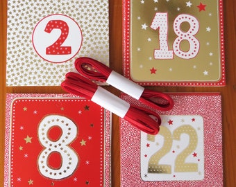 Gutschein Adventskalender Gutscheine in rot, weiß und gold, 24 Karten zum Beschriften