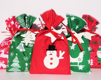 Advent calendar children to fill from fabric, 24 little bags in red and green