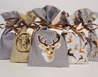 Advent calendar to fill, fabric bags in beige and gray