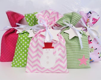 Advent calendar children for filling made of fabric, bags in pink and green