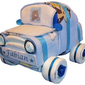 Ciasto pieluszkowe samochód dla chłopca wykonany z pieluch Niebieski samochód na pieluchy Prezent na narodziny chłopca Pamiątka z okazji baby shower