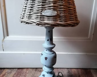 large shabby table lamp turned