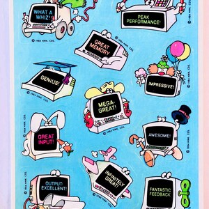 May include: A sheet of vintage 1984 Hallmark stickers featuring anthropomorphic computer characters with various expressions and text including "What a Whiz!", "Peak Performance!", "Great Memory", "Genius!", "Impressive!", "Mega-Great!", "Great Input!", "Awesome!", "Output: Excellent!", "Infinitely Great!", and "Fantastic Feedback".