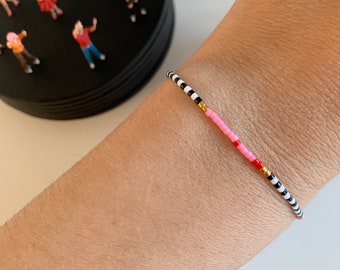 Beaded bracelet friendship bracelet colorful pink red gold black white stripes striped
