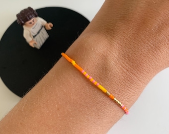 Perlenarmband Armband Freundschaftsarmband Bunt Gelb Orange Rosa Goldfarbig Glänzend Sommer Fein Filigran Minimalistisch