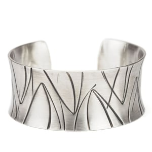 wide heavy silver bangle with pattern image 1